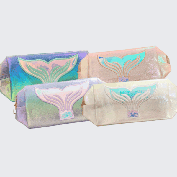 Iridescent whale-themed cosmetic pouches in pastel colors, perfect for makeup and accessories.