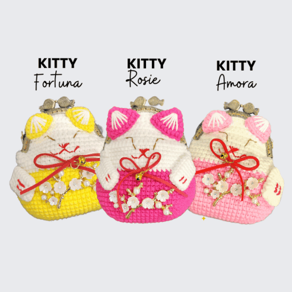 Kitty fortune, Rosie, and Amora plush coin purses with floral charms and decorative bows, perfect for accessories and gifts.