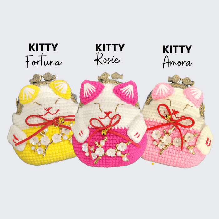Kitty fortune, Rosie, and Amora plush coin purses with floral charms and decorative bows, perfect for accessories and gifts.