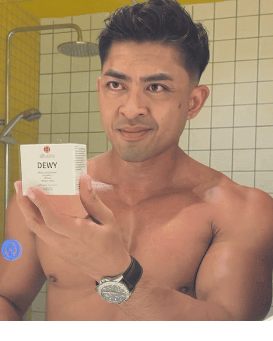 Dewy skincare product by Alluora with a shirtless man holding the jar, indoors, highlighting skincare benefits and natural ingredients.