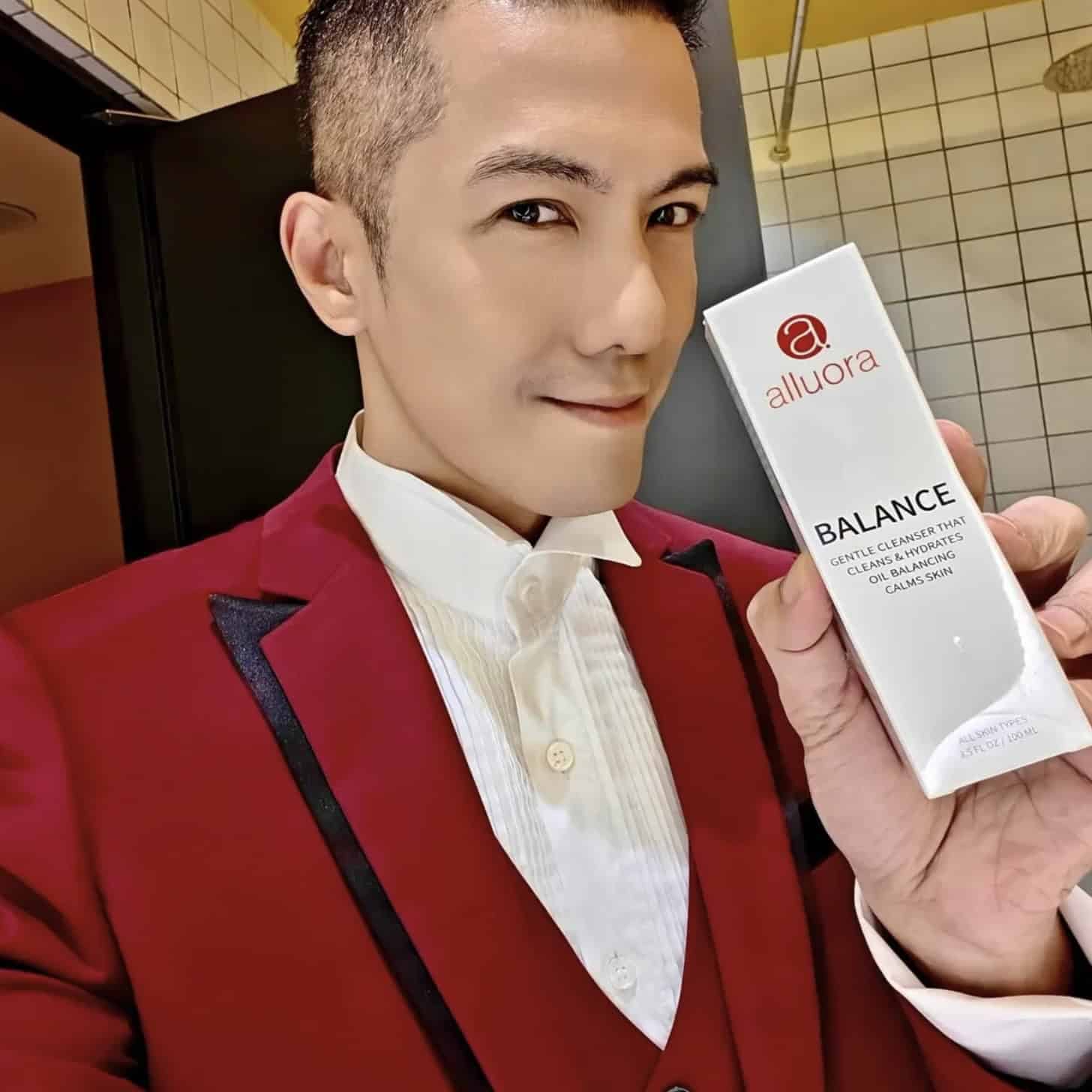 Allura skincare product, skincare routine, man holding Alluora Balance product, skincare enthusiast, bright indoor lighting.