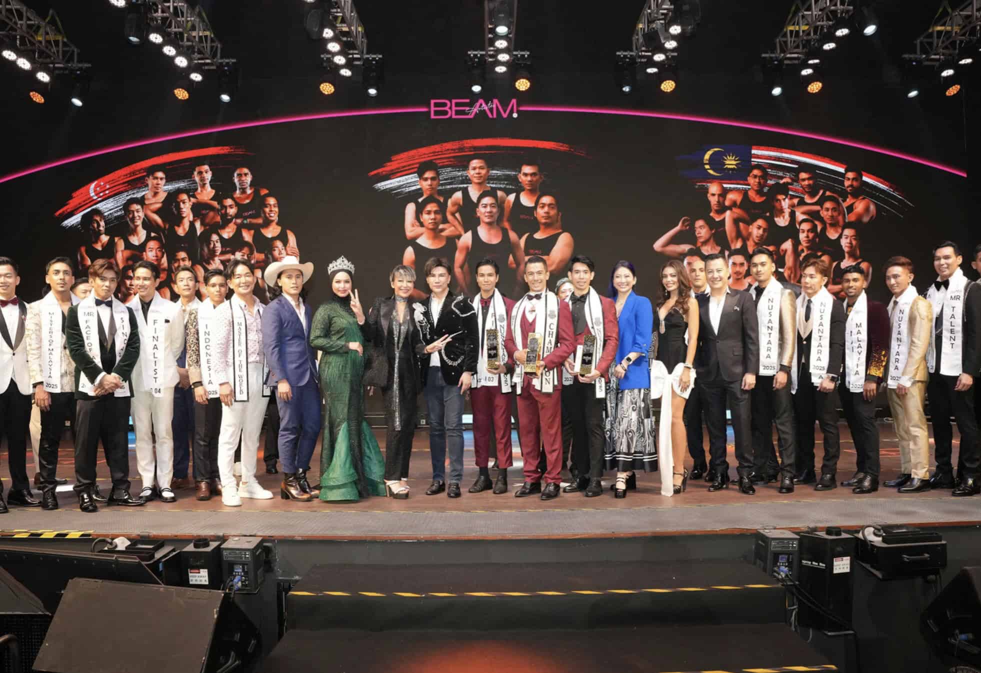 Group of beauty pageant contestants and organizers at a fashion event in Kuala Lumpur, Malaysia.