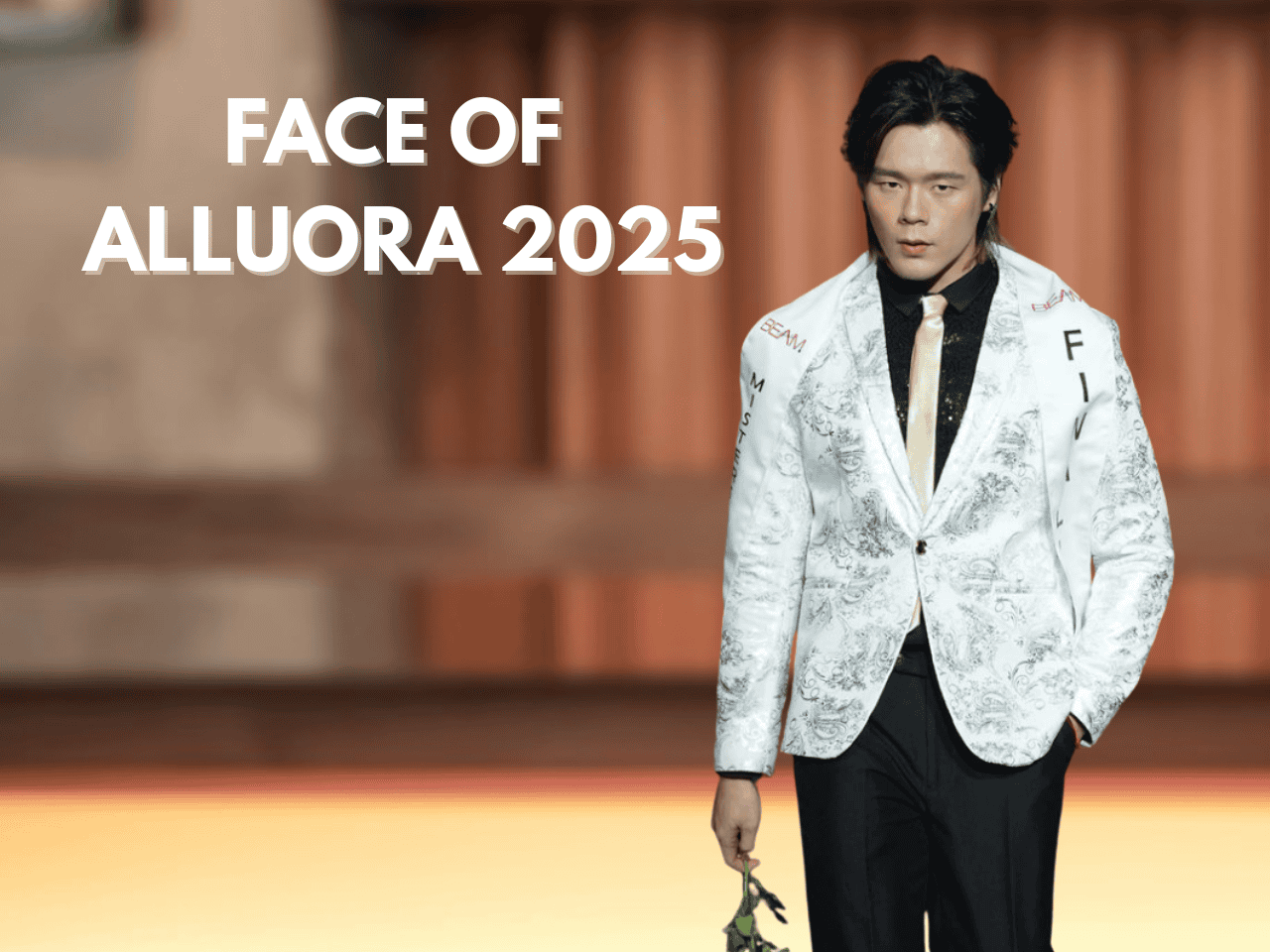 Elegant male model on runway showcasing Alluora 2025 fashion collection at the fashion show.