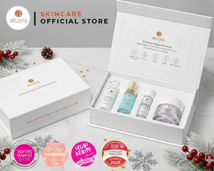 Alluora skincare gift set with cleansers, serums, and moisturizer in elegant box.